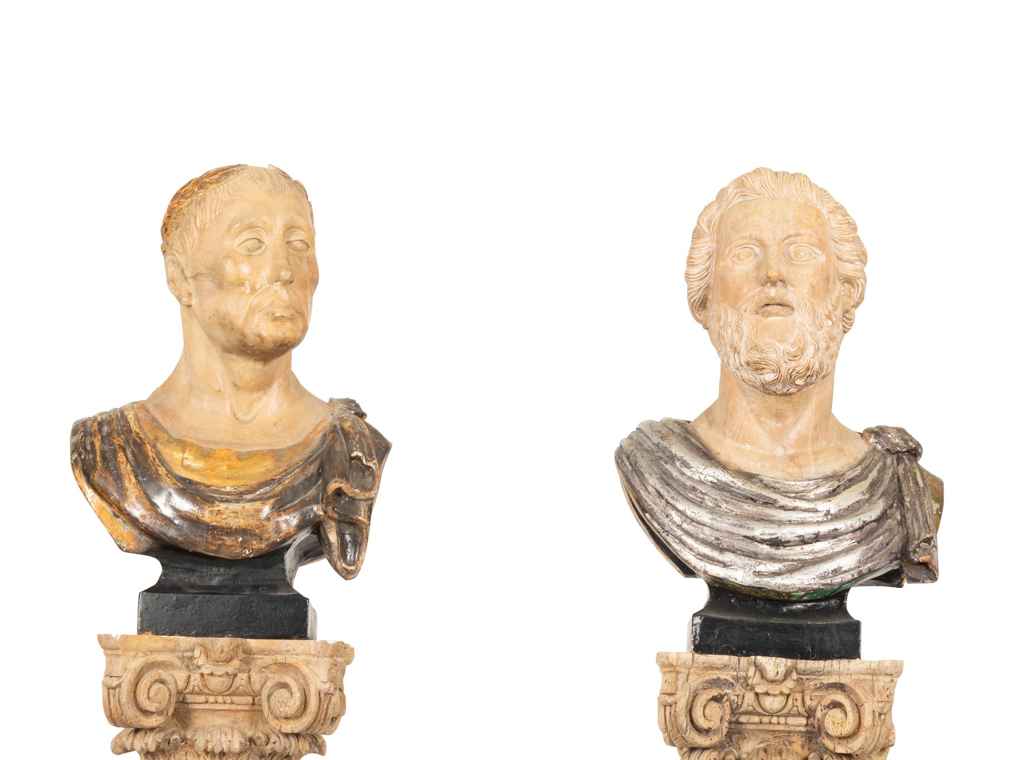 A Pair of Italian Carved and Parcel Gilt Busts Raised on Carved and Painted Columns