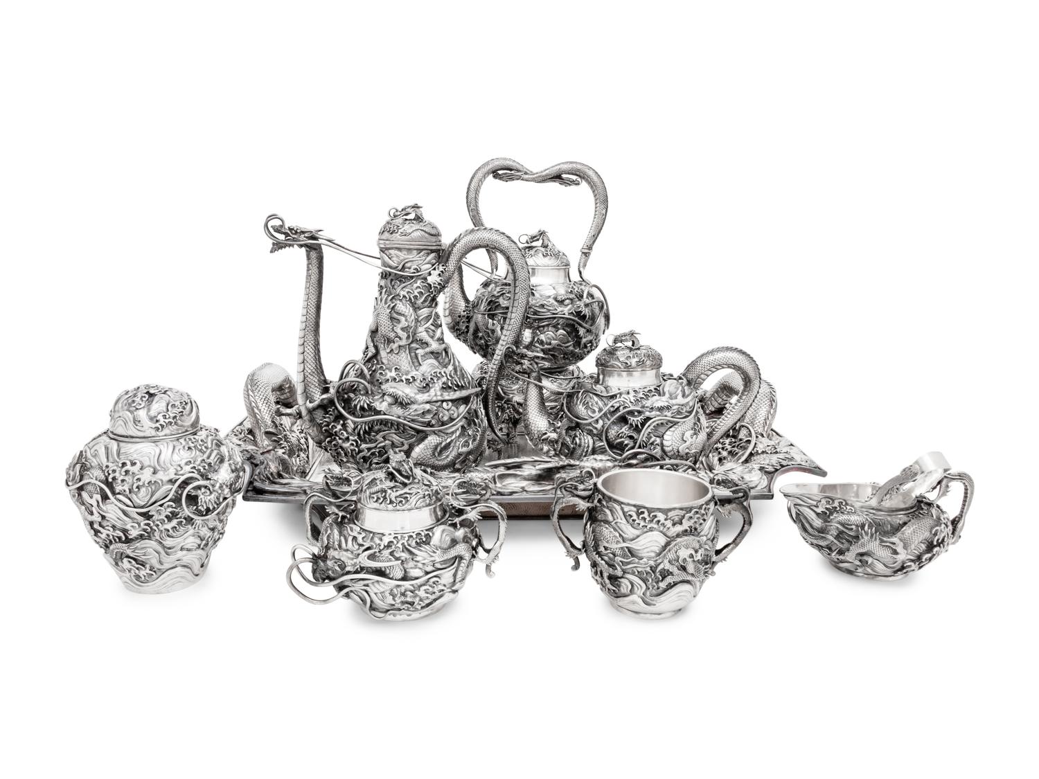 An Ornate Japanese Export Silver Eight-Piece Tea and Coffee Service