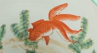 A Chinese Porcelain Fish Bowl and Wood Stand