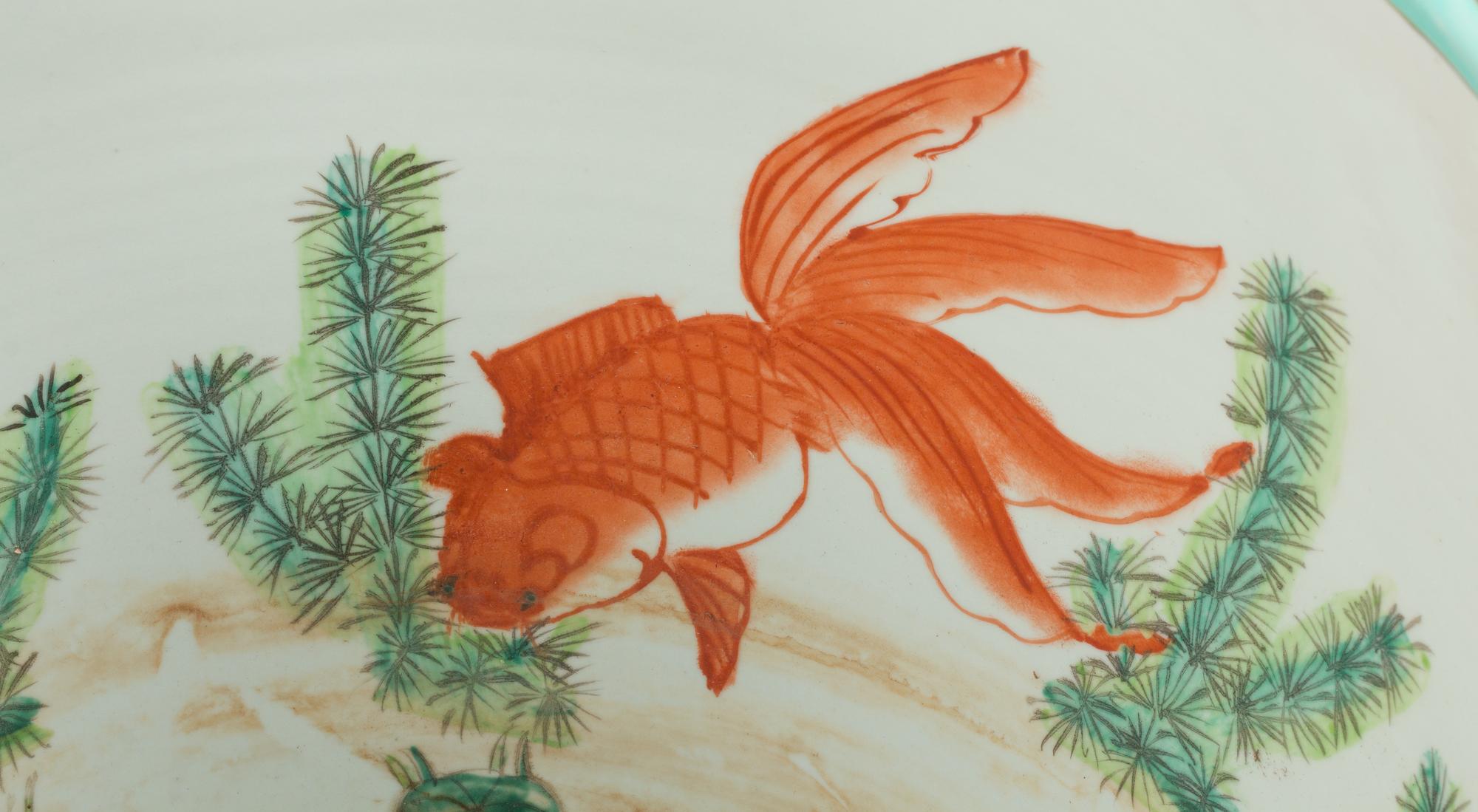 A Chinese Porcelain Fish Bowl and Wood Stand