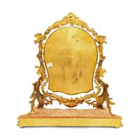 A Rococo Revival Gilt Bronze and Giltwood Dressing Mirror