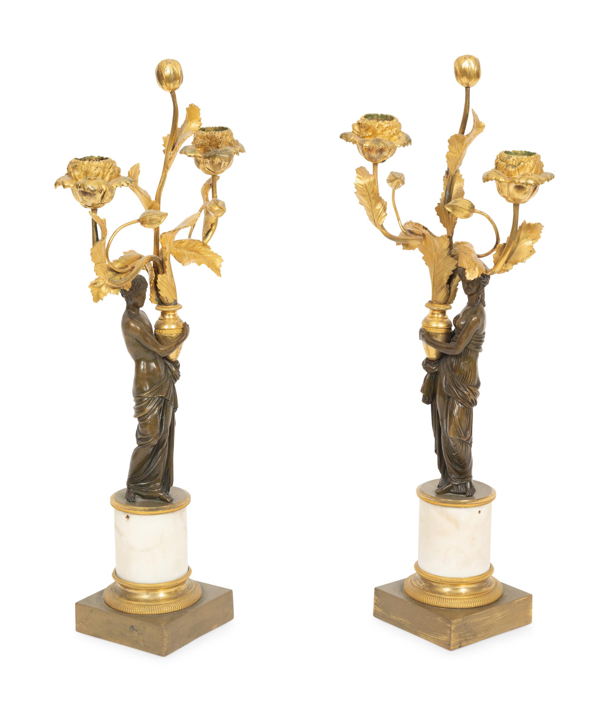 A Pair of Lous XVI Style Gilt and Patinated Bronze and Marble Figural Candelabra