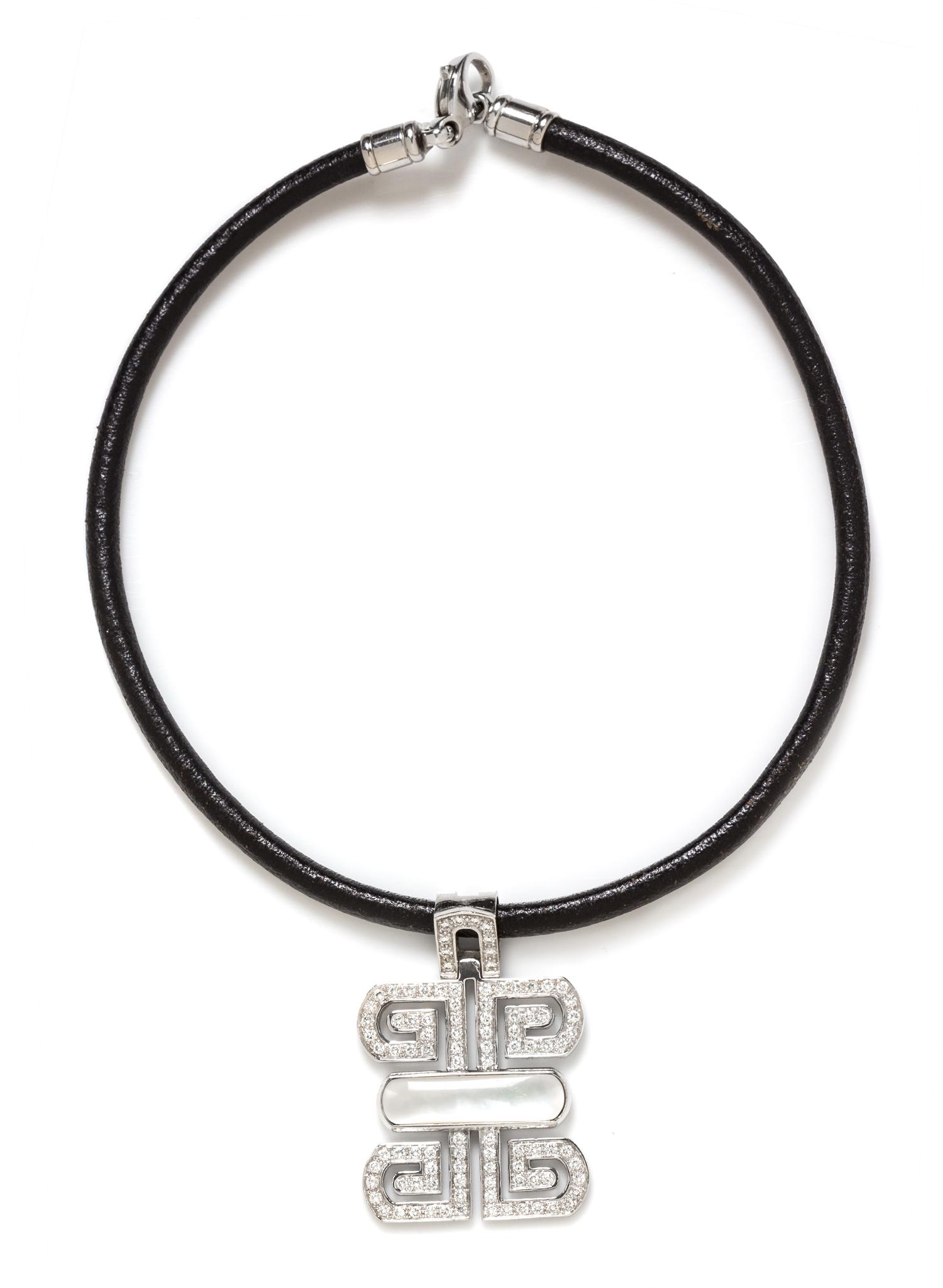 An 18 Karat White Gold, Diamond and Mother-of-Pearl Pendant with Steel and Leather Necklace by Bvlgari, 23.65 dwts. (with necklace)
