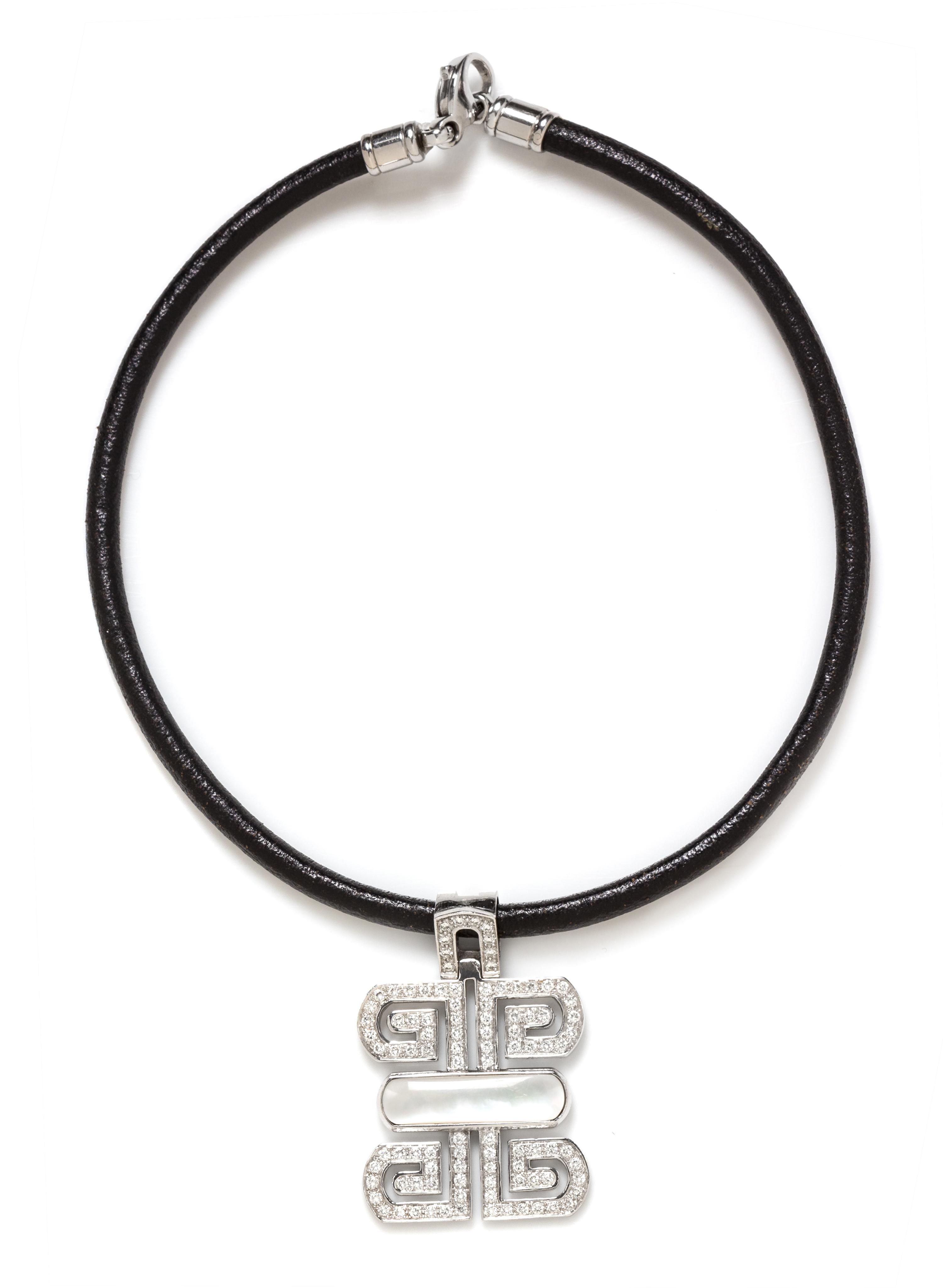 An 18 Karat White Gold, Diamond and Mother-of-Pearl Pendant with Steel and Leather Necklace by Bvlgari, 23.65 dwts. (with necklace)