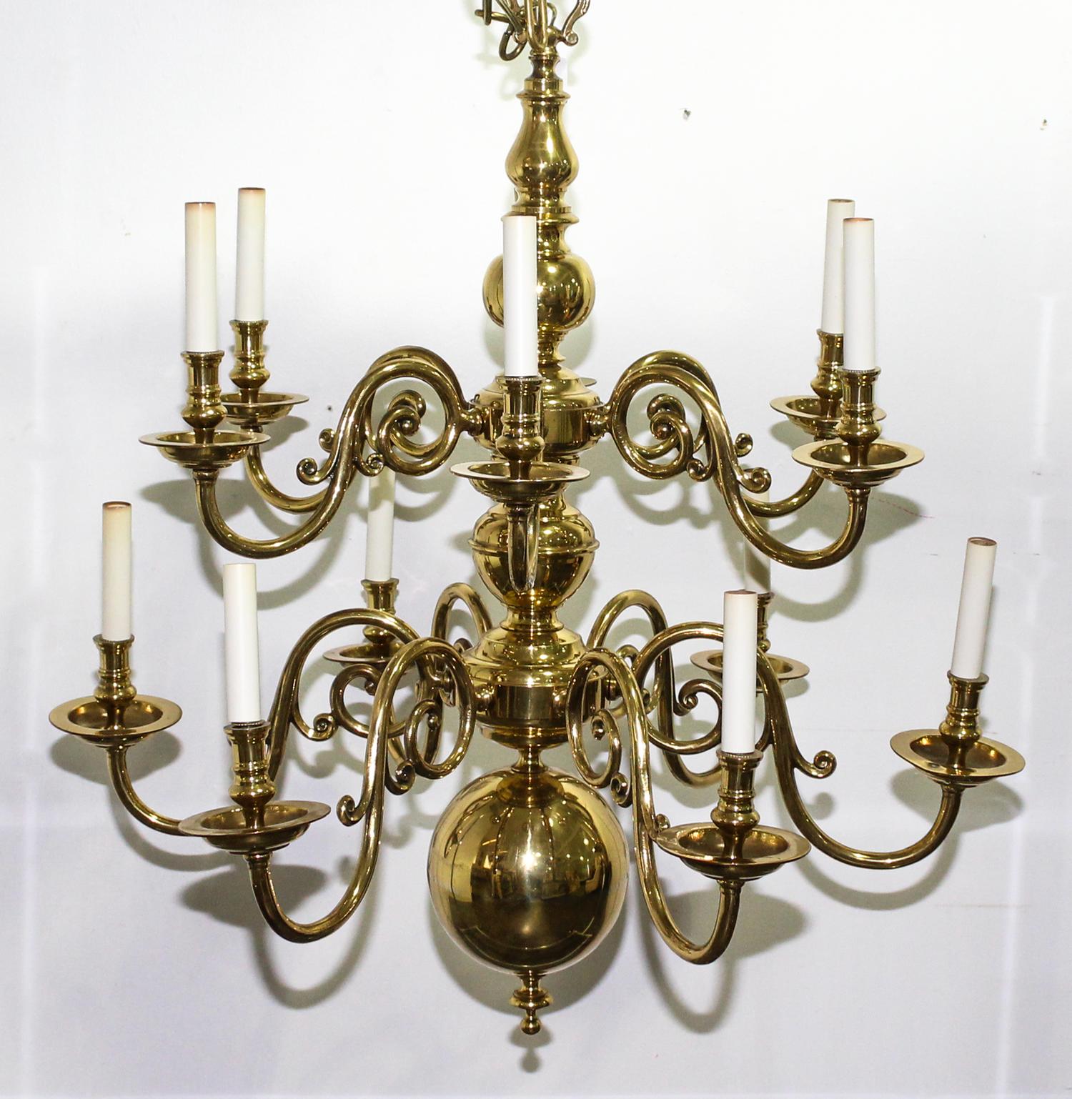A Pair of Dutch Baroque Style Brass Twelve Light Chandeliers Diameter 30 1/4 inches.