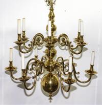 A Pair of Dutch Baroque Style Brass Twelve Light Chandeliers Diameter 30 1/4 inches.