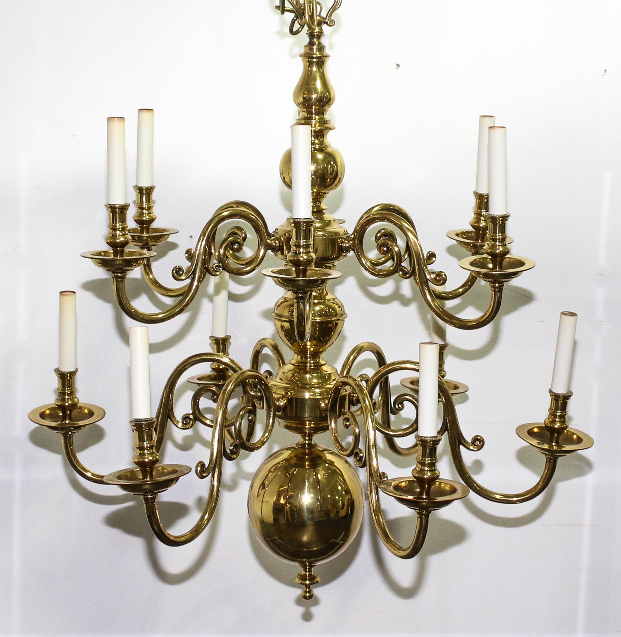 A Pair of Dutch Baroque Style Brass Twelve Light Chandeliers Diameter 30 1/4 inches.