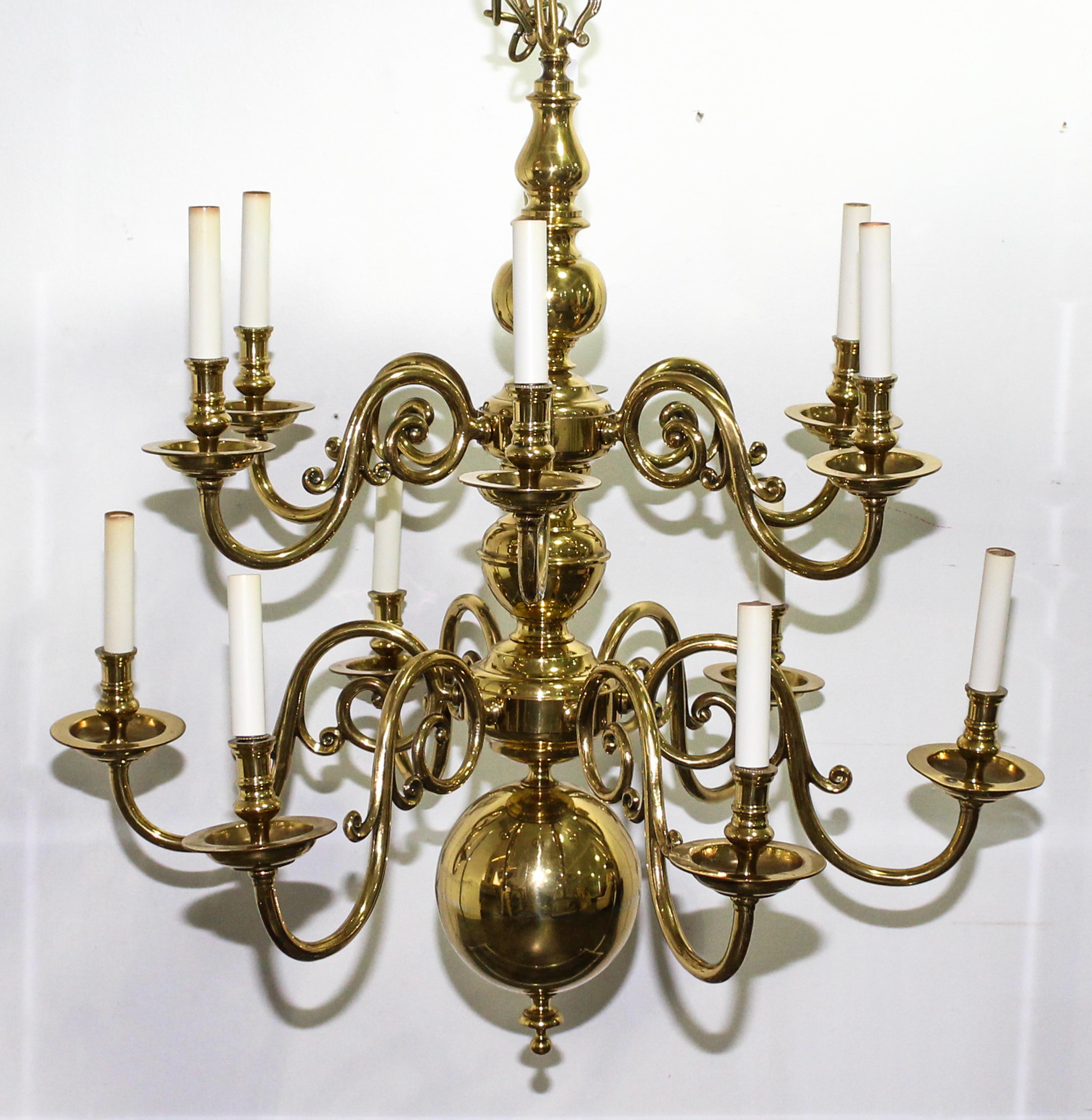 A Pair of Dutch Baroque Style Brass Twelve Light Chandeliers Diameter 30 1/4 inches.
