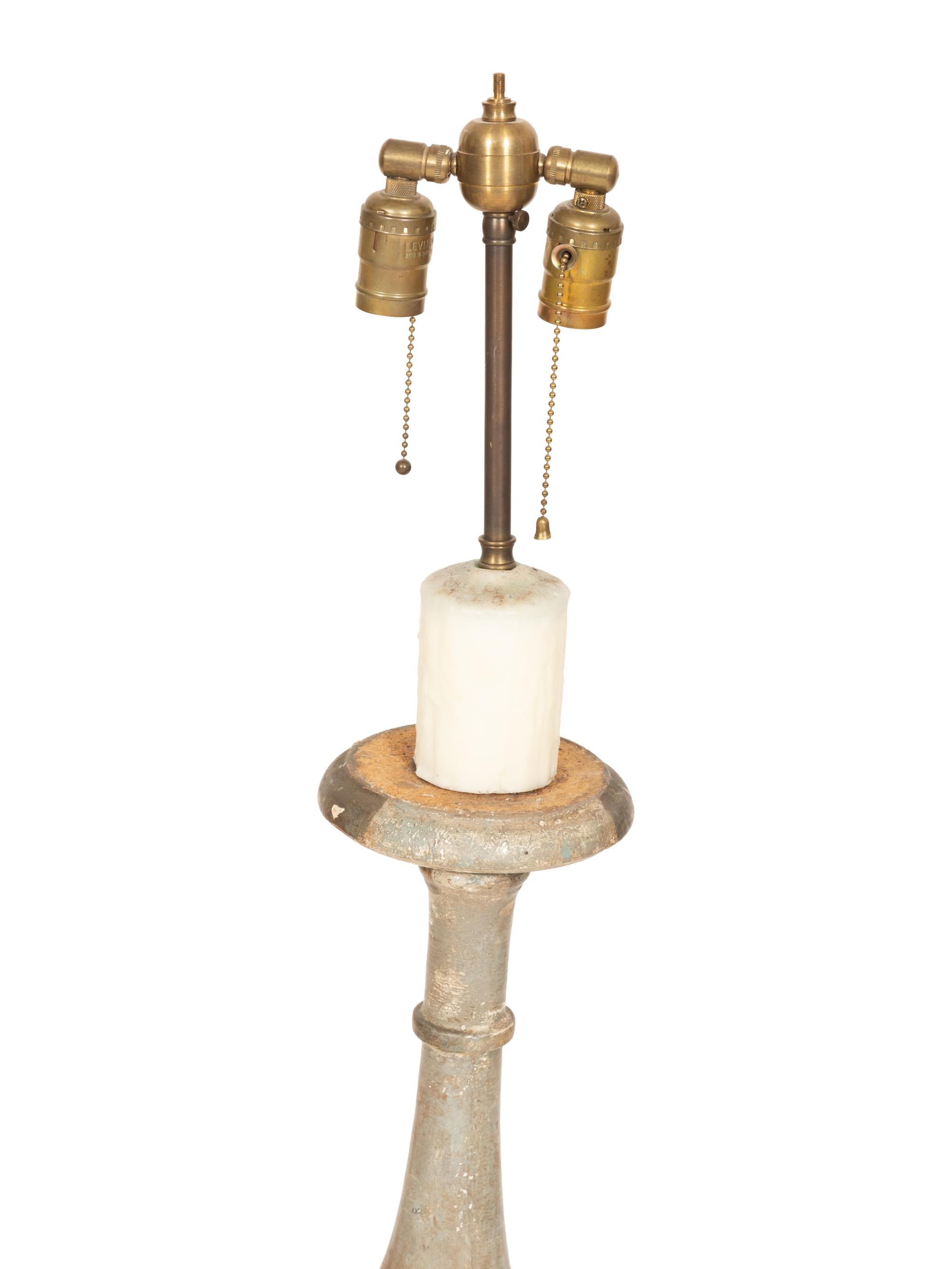 A Pair of Italian Green Painted and Parcel Gilt Pricket Sticks Now Mounted as Lamps