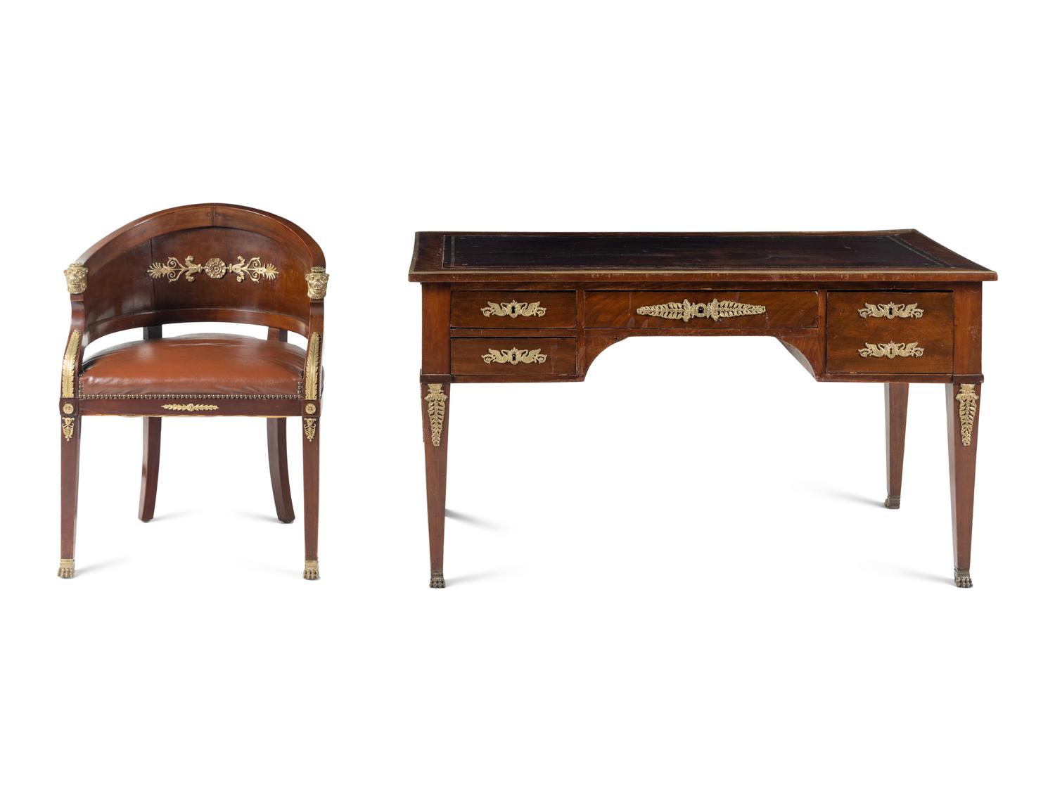 An Empire Style Gilt Metal Mounted Mahogany Bureau Plat and an Associated Armchair