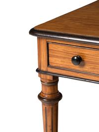 An English Satinwood and Parcel-Ebonized Dressing Table