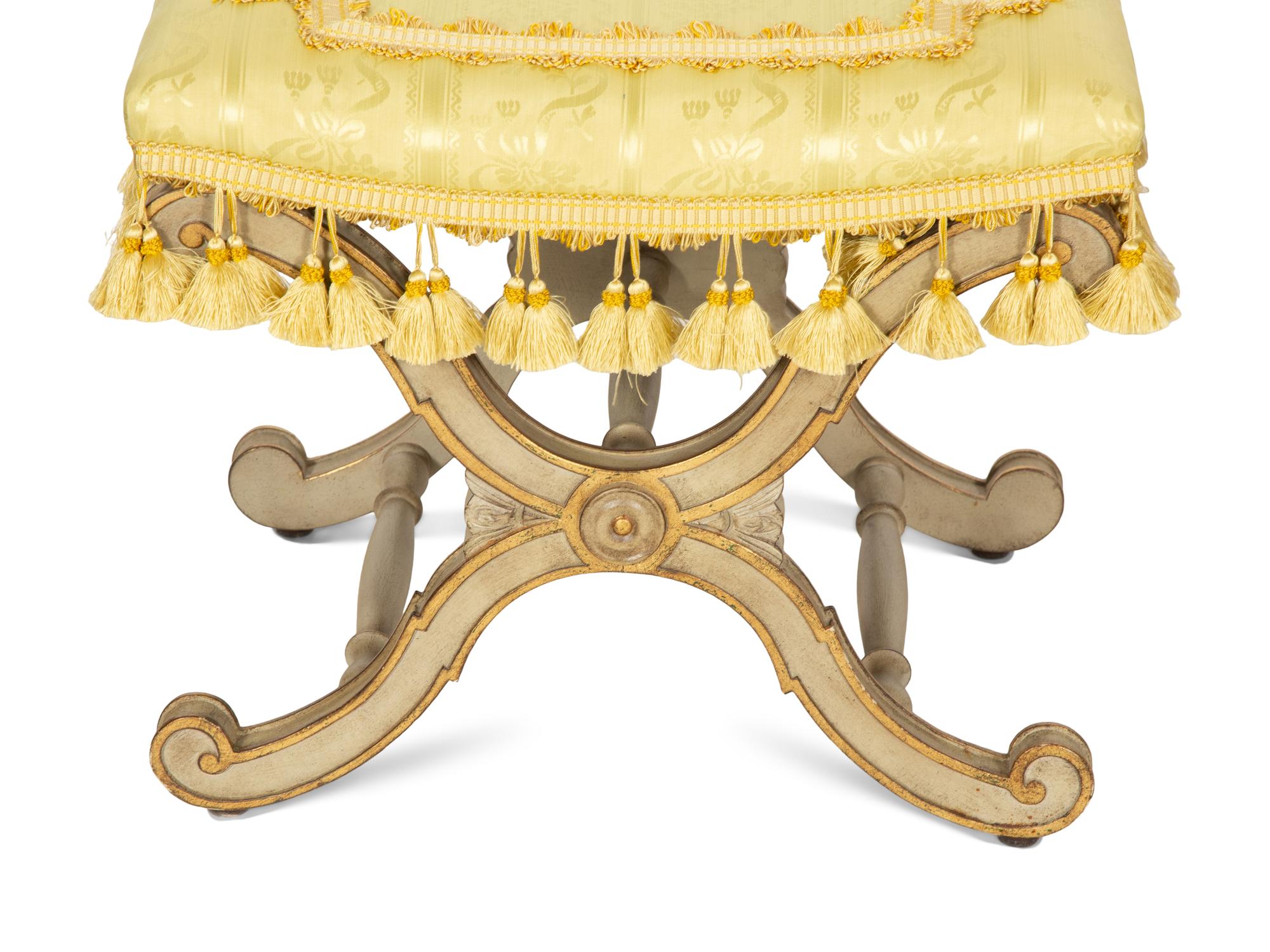 A Pair of Italian Gray-Painted and Parcel Gilt Stools