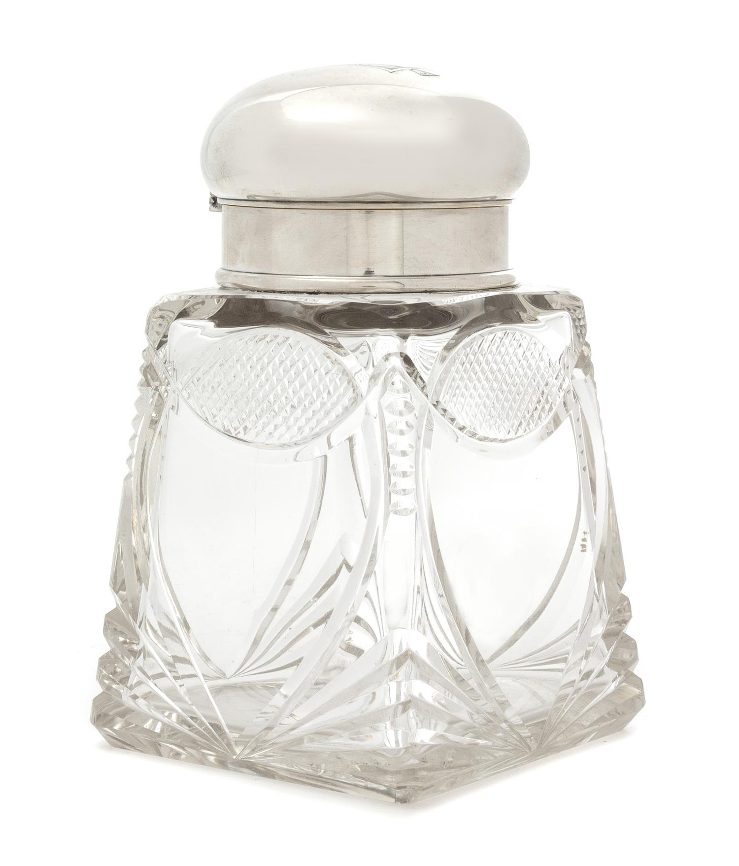 A Russian Silver Mounted Cut Glass Tea Caddy, Mark of K. Faberge, Late 19th/Early 20th Century, the domed silver top with an engraved m