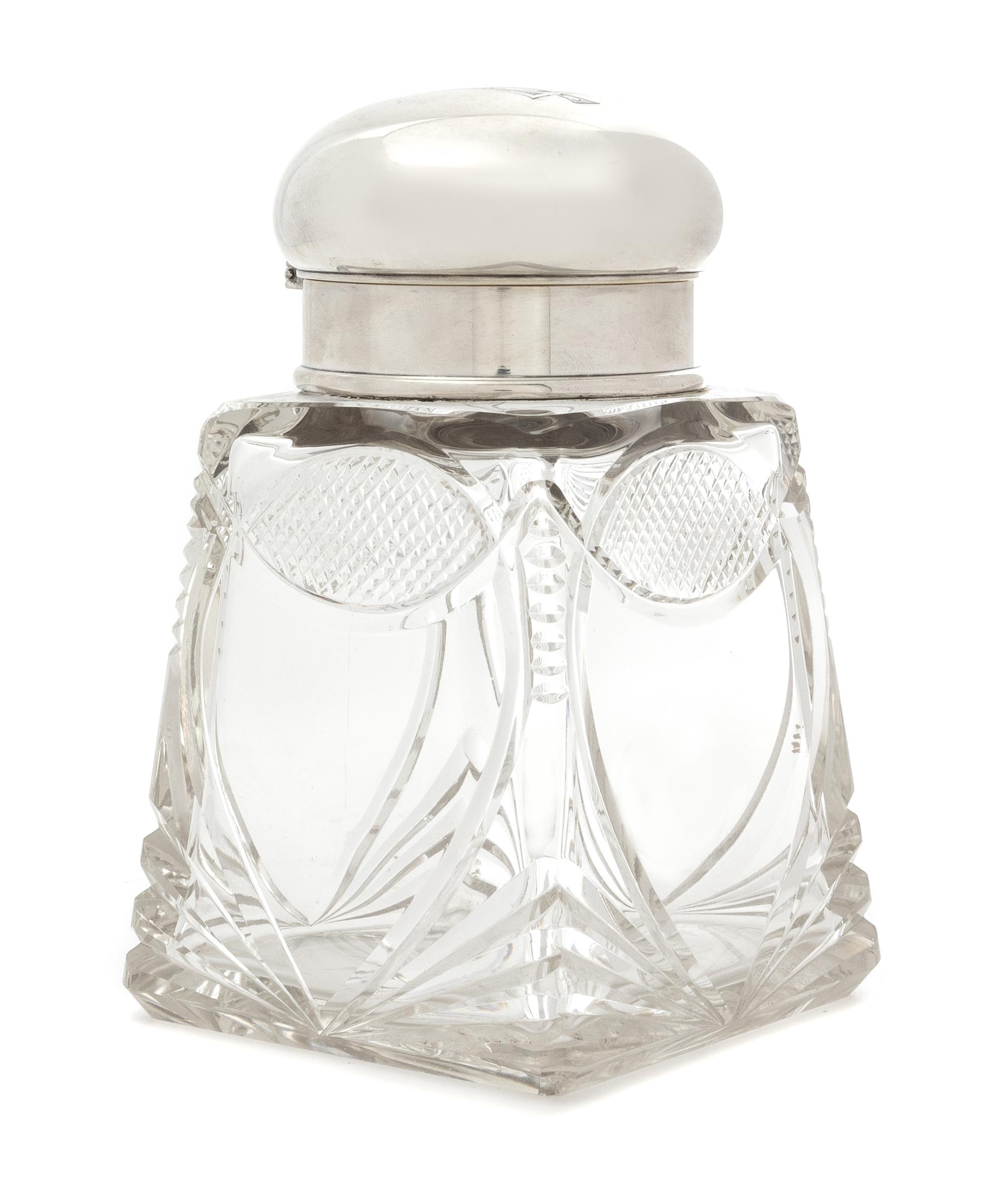 A Russian Silver Mounted Cut Glass Tea Caddy, Mark of K. Faberge, Late 19th/Early 20th Century, the domed silver top with an engraved m