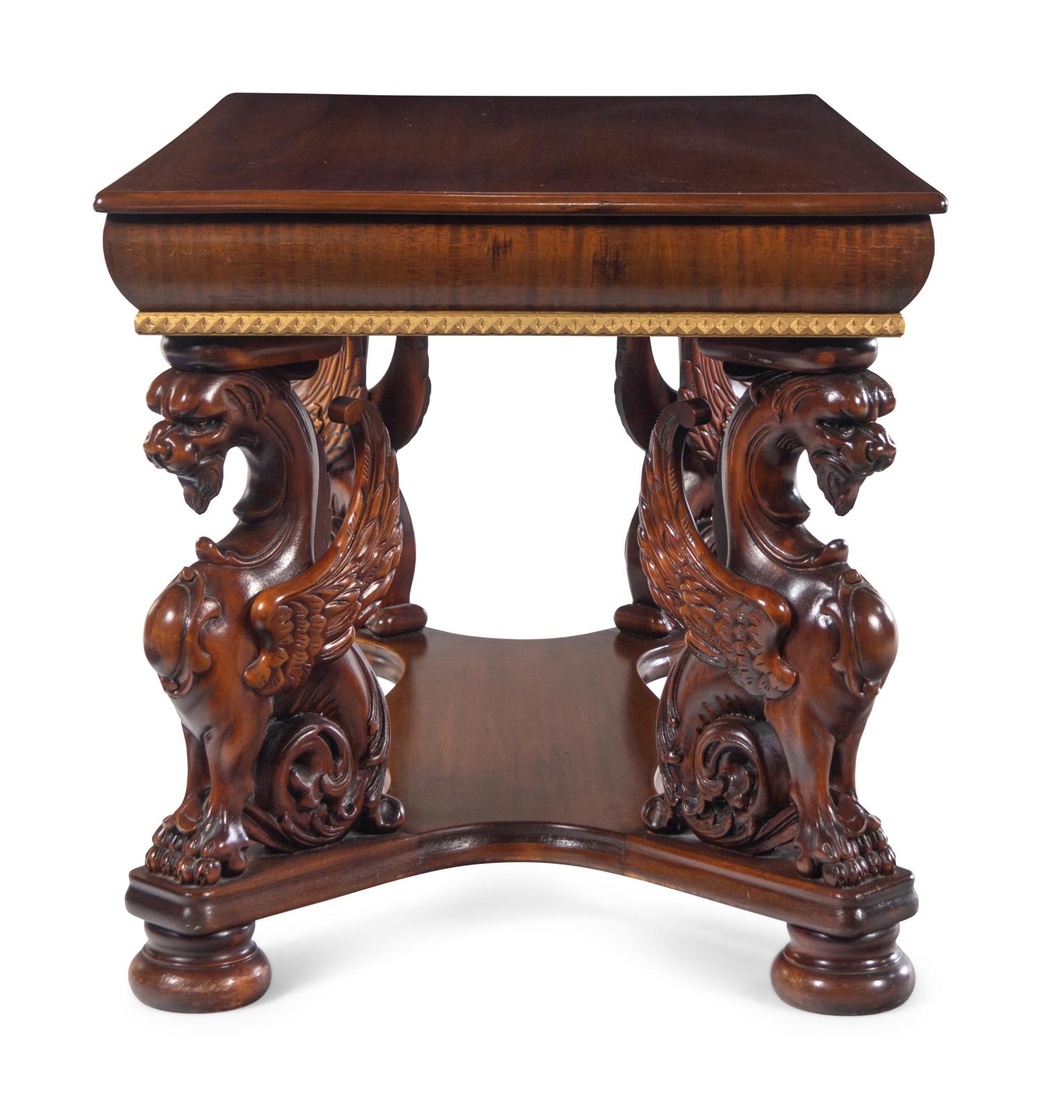 A Renaissance Revival Carved Walnut Library Table