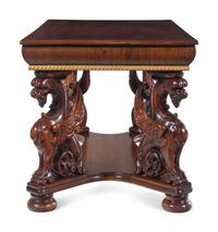 A Renaissance Revival Carved Walnut Library Table