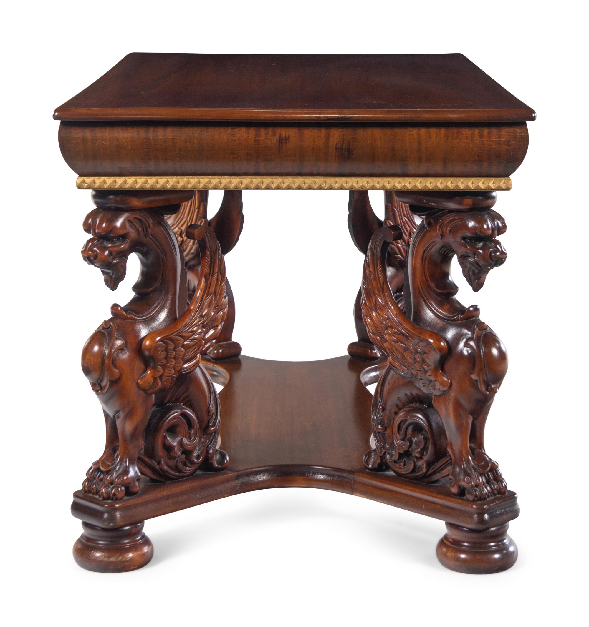 A Renaissance Revival Carved Walnut Library Table
