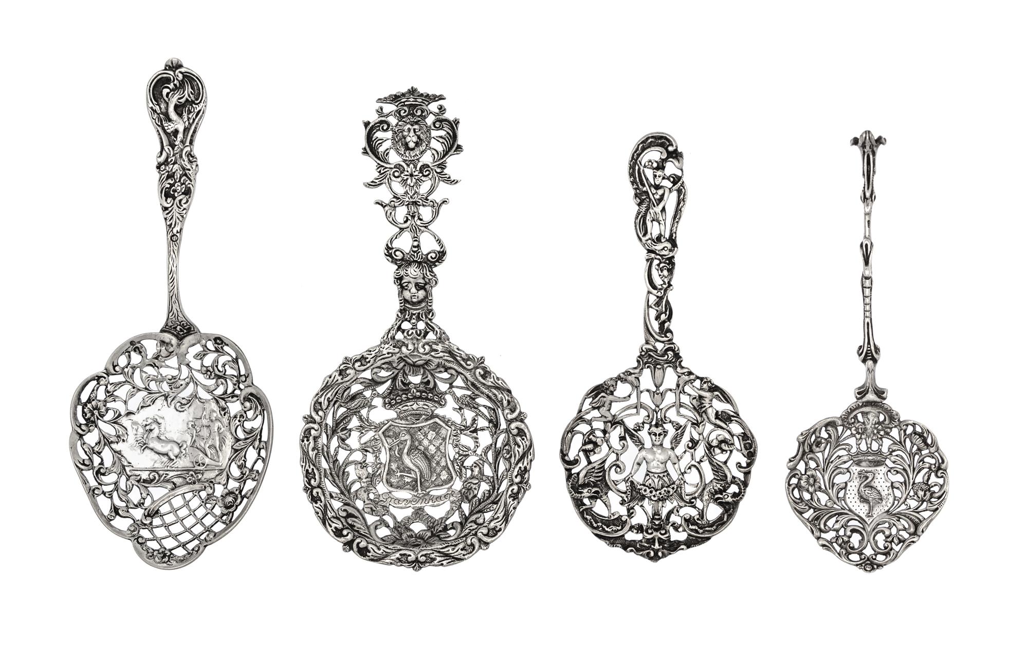 A Group of Four Continental and English Silver Serving Spoons, Various Makers, 19th/20th Century, each having a pierced bowl and foliat
