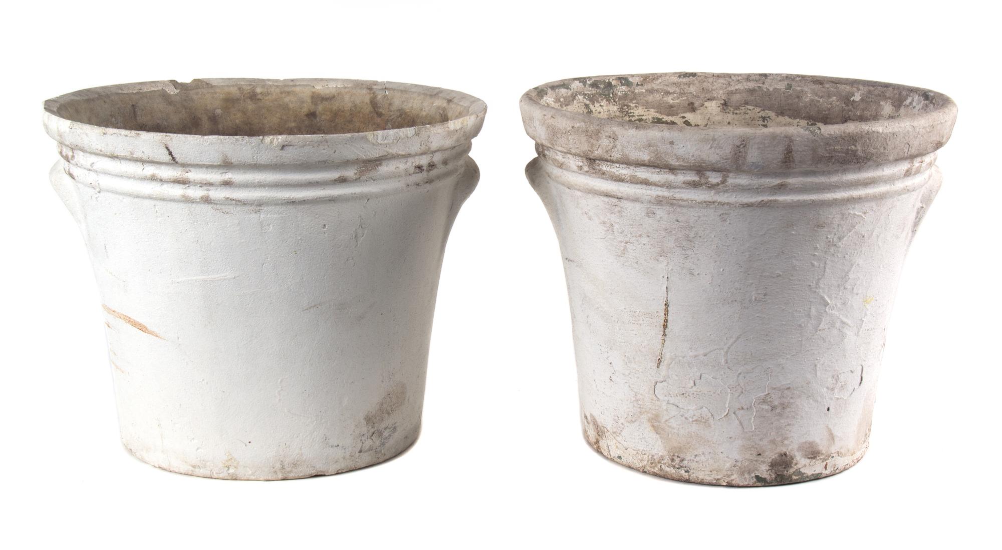 A Group of 6 Concrete Planters Height of largest 13 1/2 inches x depth 16 1/2 inches.