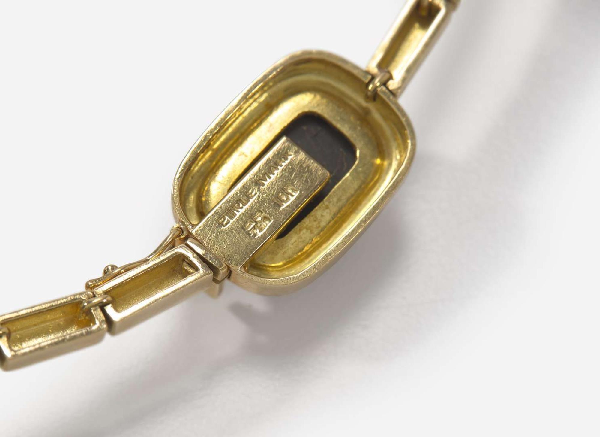 A Set of Matching Haroldo Burle Marx 18K Yellow Gold and Black Tourmaline Necklace and Ear Clips