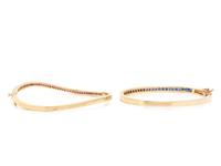 COLLECTION OF YELLOW GOLD AND GEMSTONE BANGLE BRACELETS