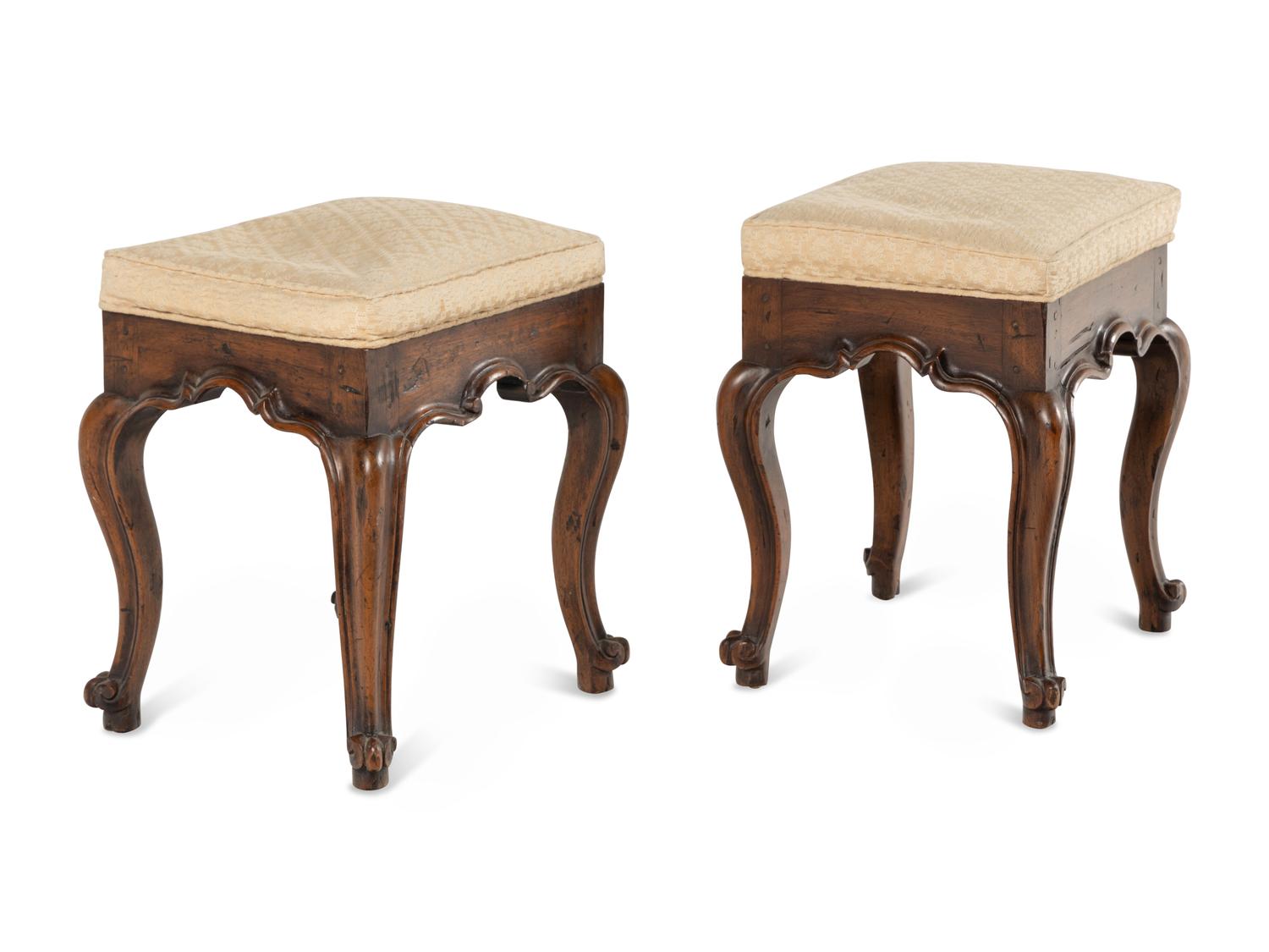 A Pair of Italian Carved Walnut Tabourets
