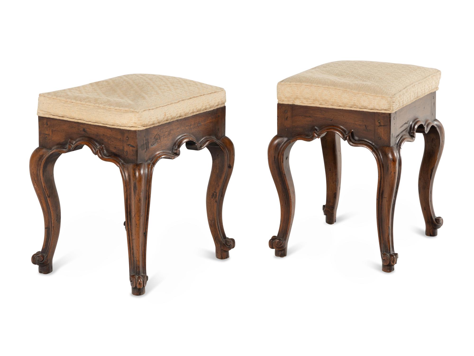 A Pair of Italian Carved Walnut Tabourets