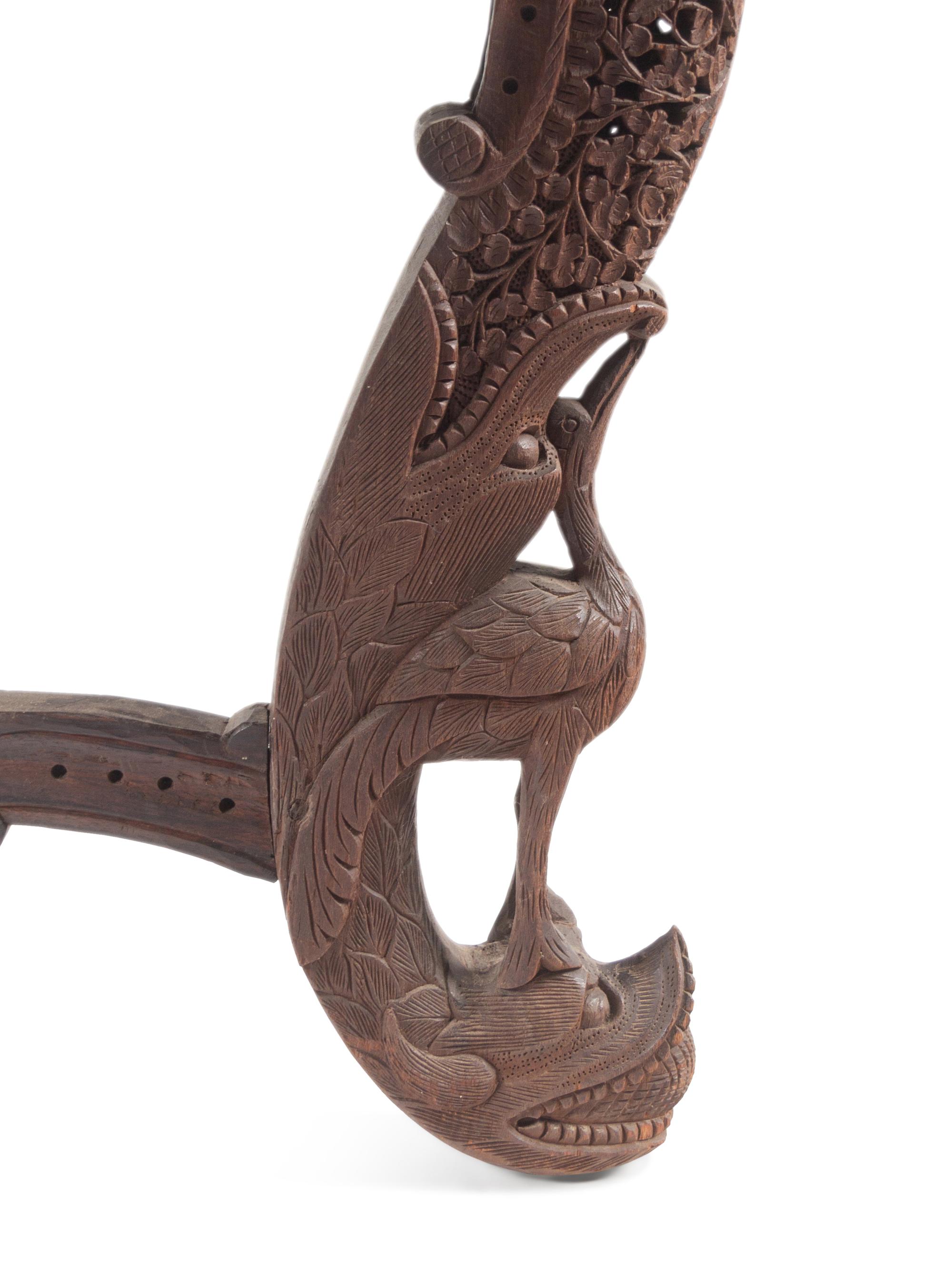 An Anglo-Indian Carved Teakwood Table
