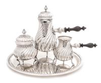 An Italian Silver Coffee Service, Buccellati, 20th Century, comprising a coffee pot, a covered sugar, a creamer, and a tray, the servin