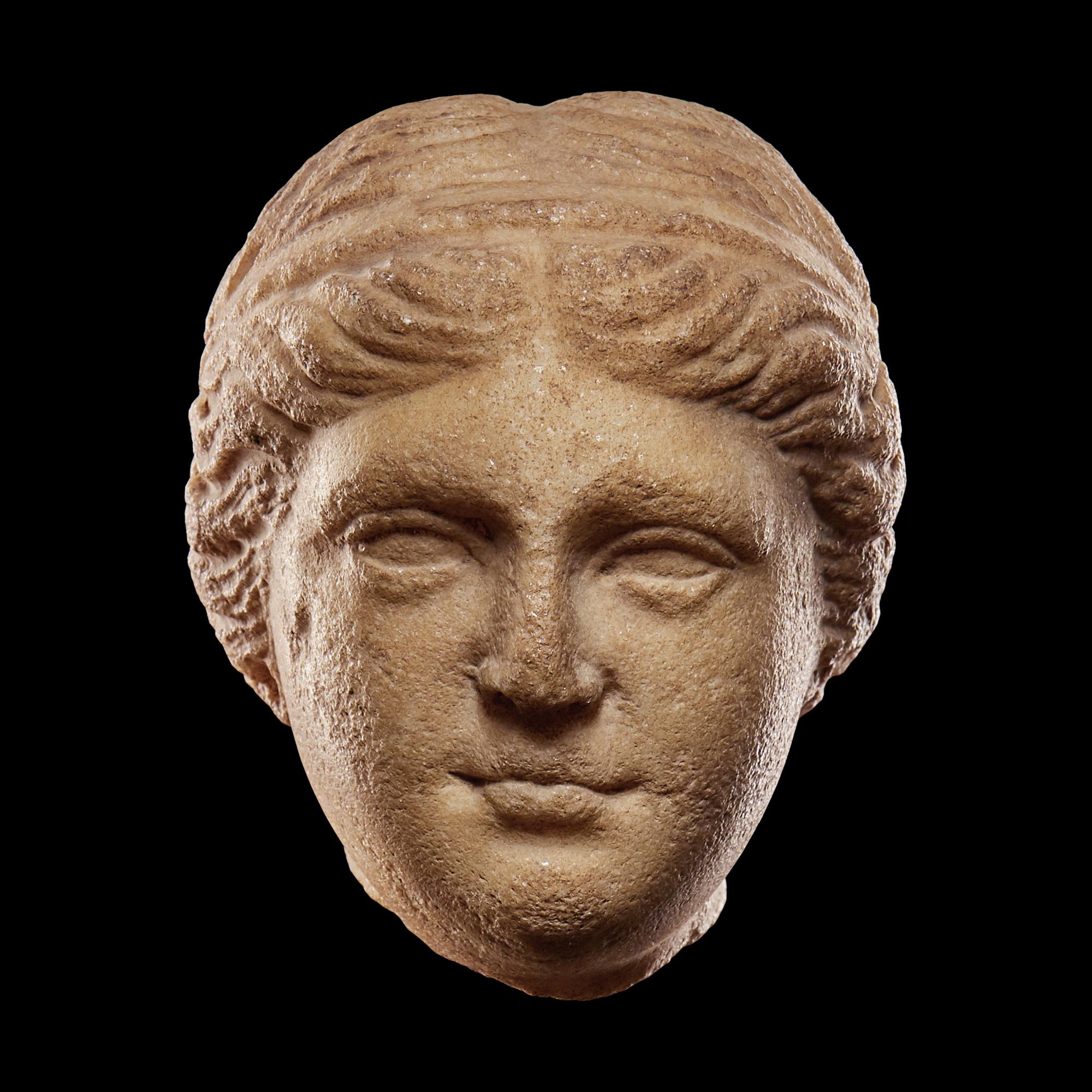 A Roman Marble Portrait Head of a Woman