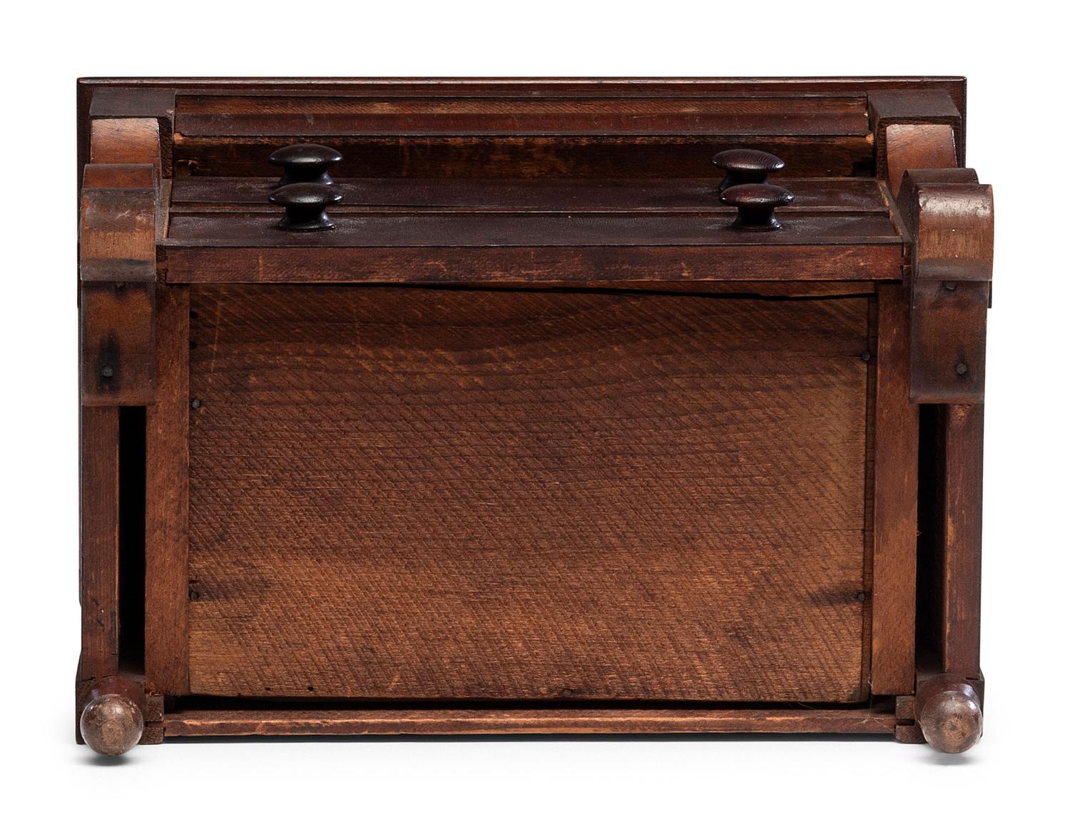 A Diminutive American Empire Mahogany Chest of Drawers