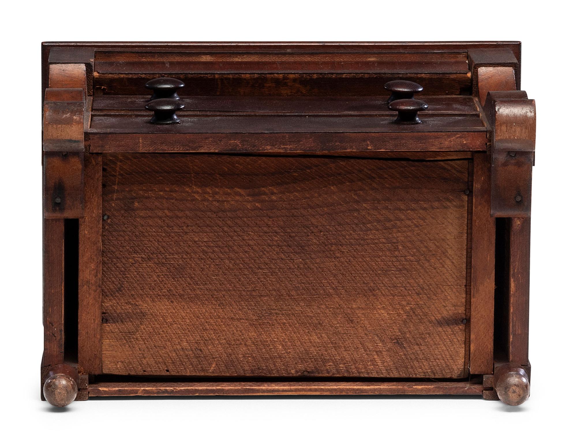 A Diminutive American Empire Mahogany Chest of Drawers