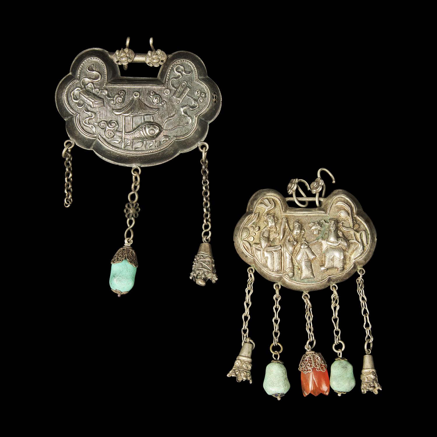 A Chinese Silver Necklace and Eight Chinese Silver Ruyi Lock-Form Pendants, Qing Dynasty 清 銀項圈一及銀如意頭形長命鎖一組八件