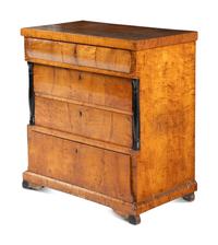 A Biedermeier Maple Chest of Drawers