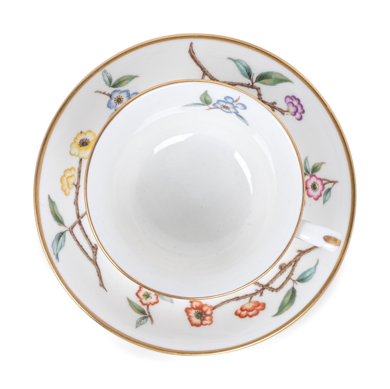 A Set of Eleven Royal Worcester Porcelain Teacups and Saucers