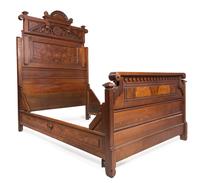 A Victorian Walnut Bed Height of headboard 83 inches. — 19TH CENTURY
