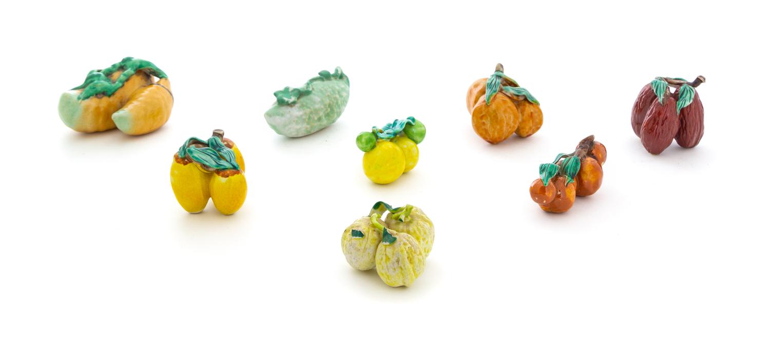 Eight Enameled Porcelain Models of Fruits and Vegetables Length of largest 3 inches. — 20TH CENTURY