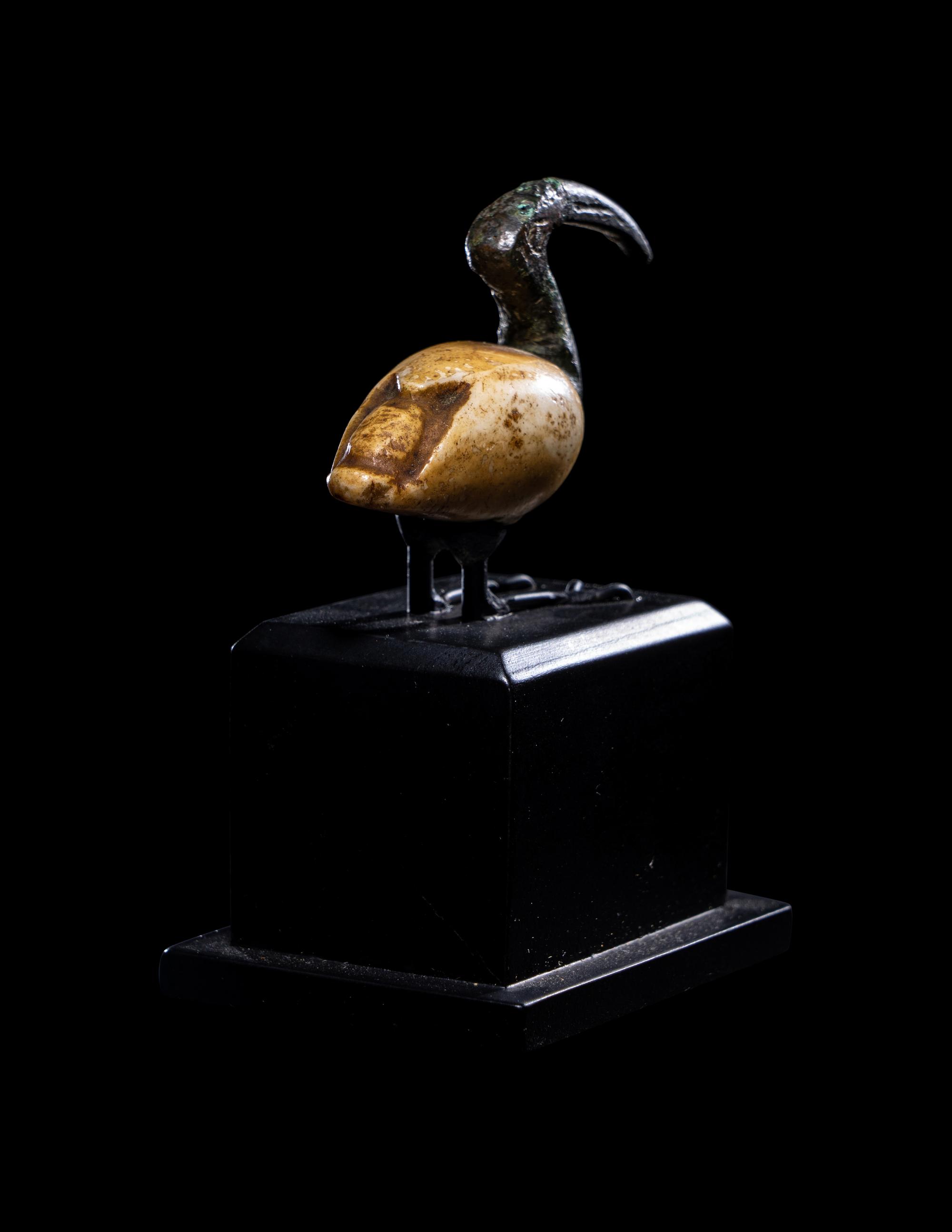 An Egyptian Bronze and Alabaster Ibis