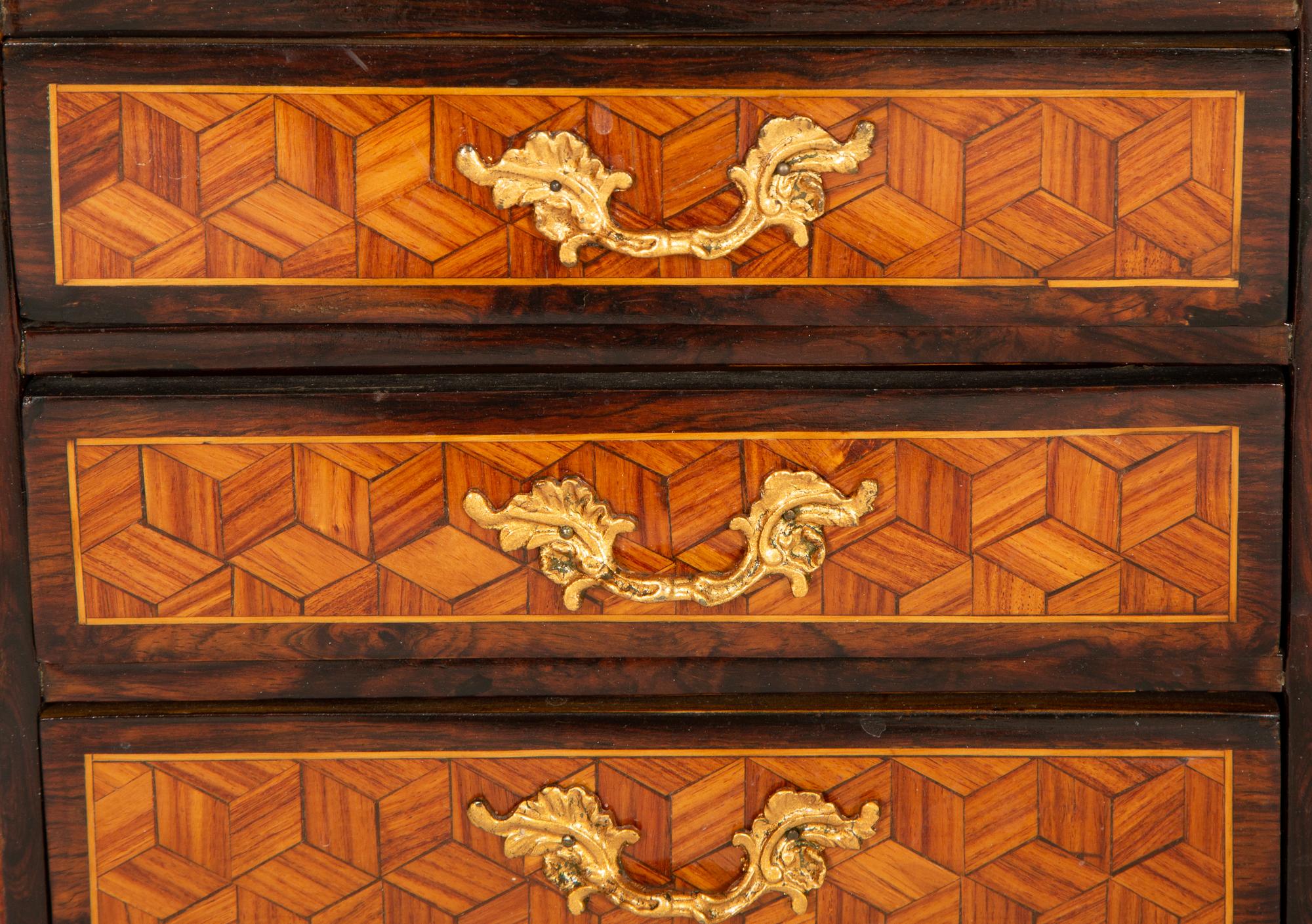 A Diminutive Gilt Bronze Mounted Parquetry Chest of Drawers