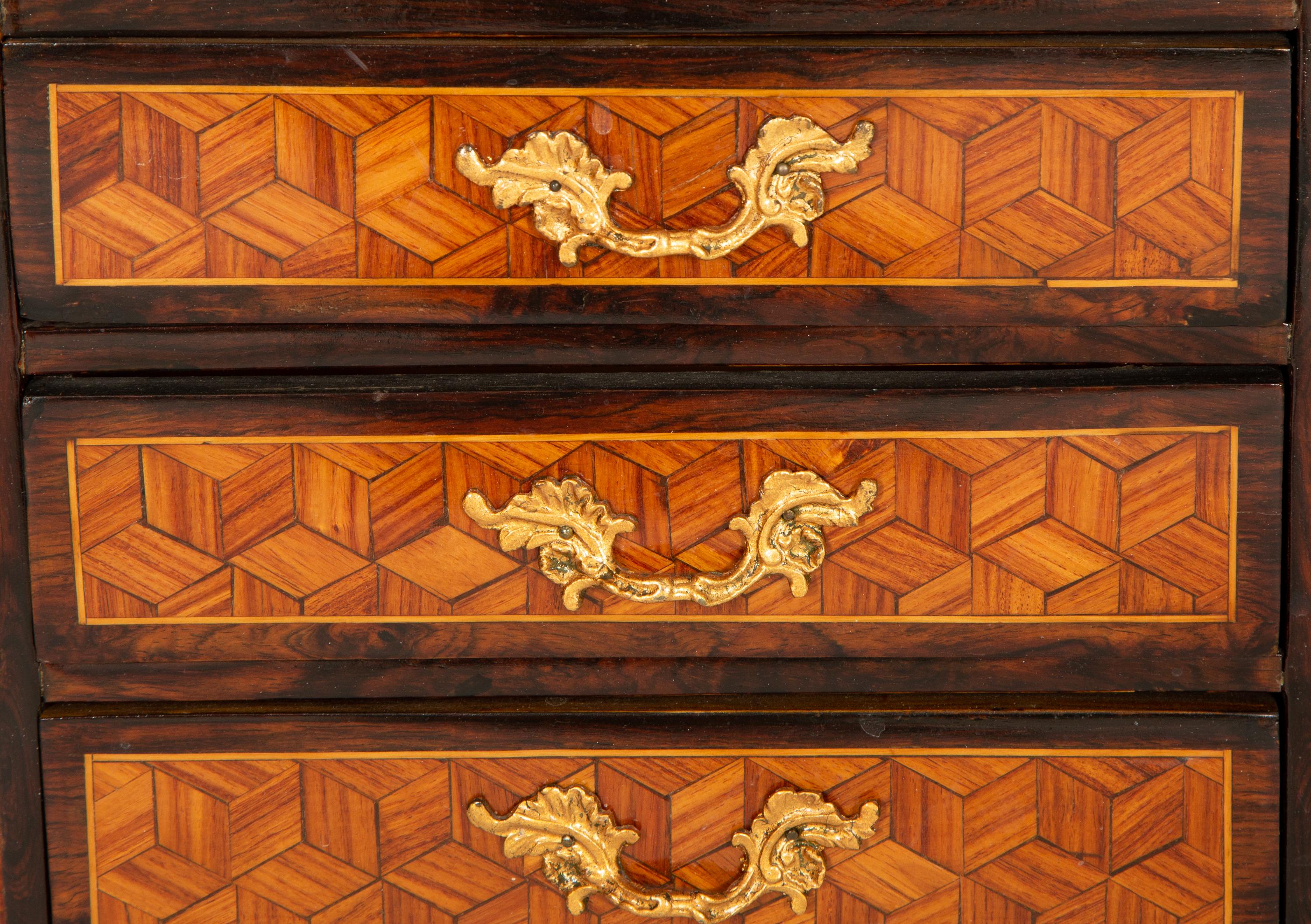A Diminutive Gilt Bronze Mounted Parquetry Chest of Drawers