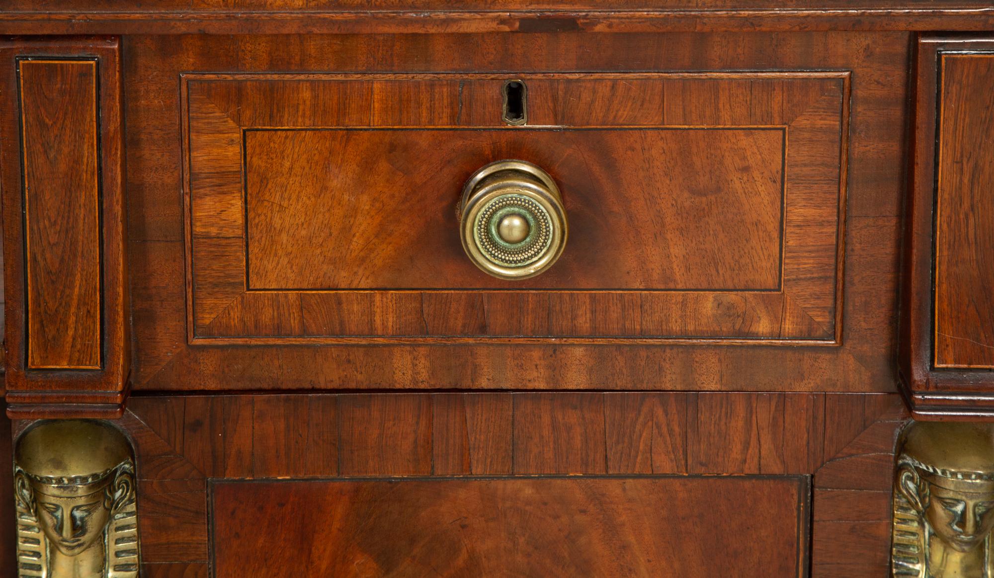 A Regency Gilt Bronze Mounted Mahogany Two-Pedestal Sideboard