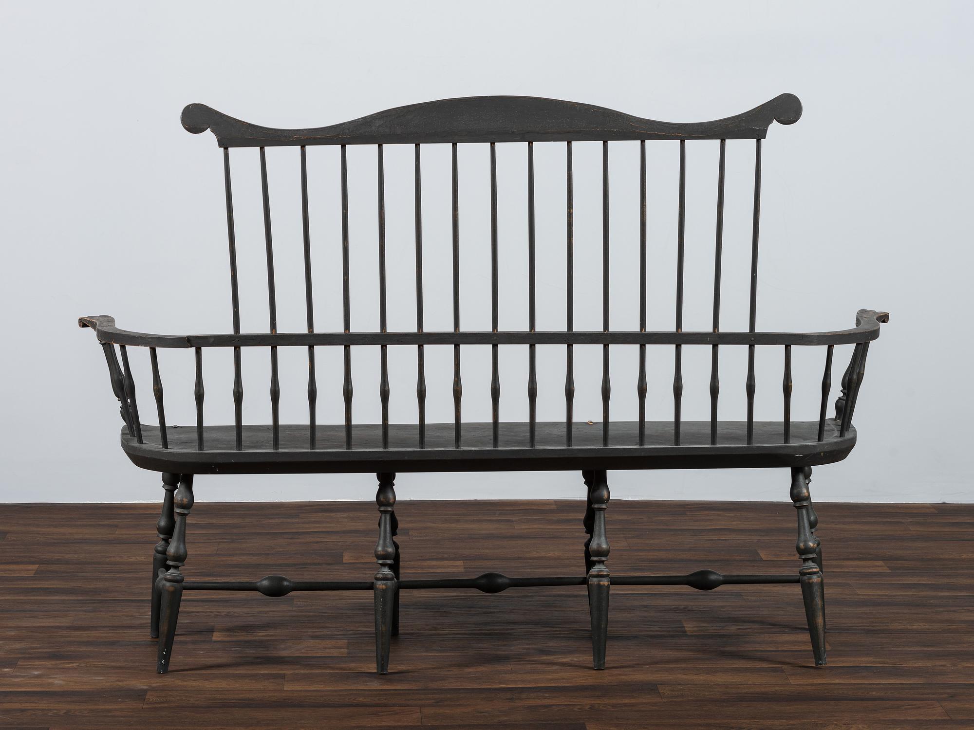 A Volute Carved Comb-Back Windsor Bench