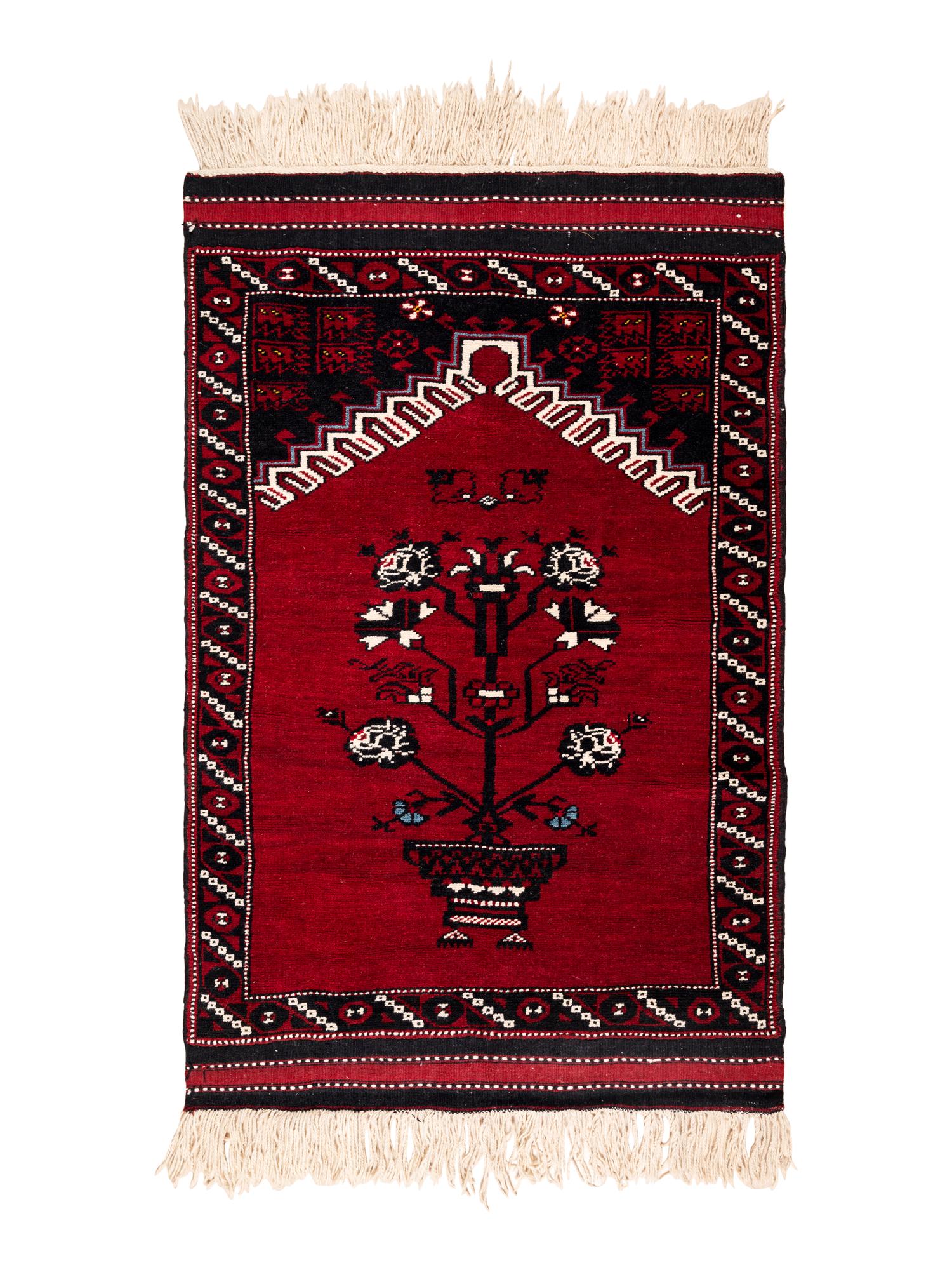 Four Turkish Wool Mats and a Baluch Design Wool Mat