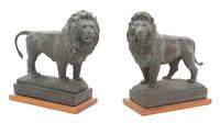 Pair of Composition Collosal Lions Bookends Height 8 3/4 inches. — 20TH CENTURY