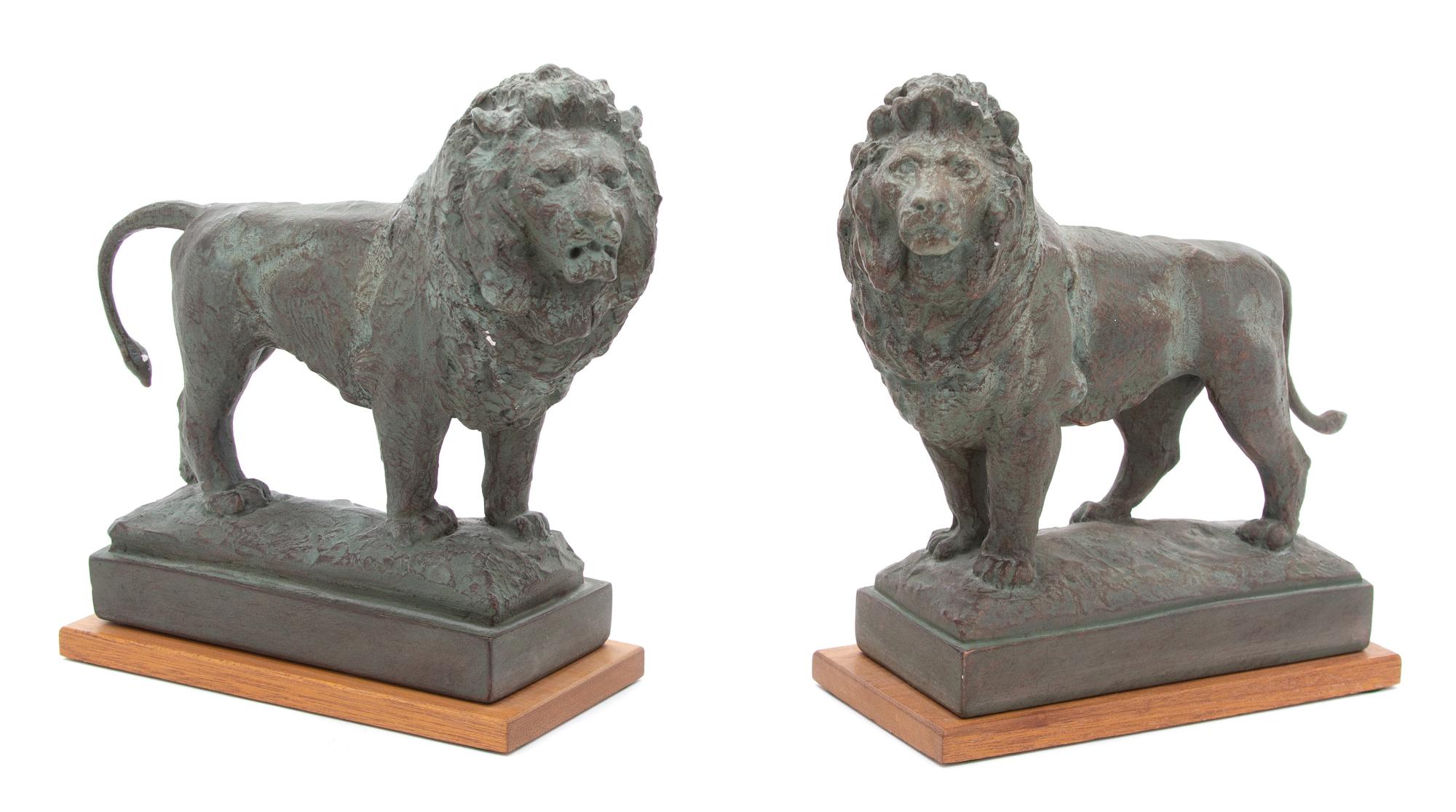 Pair of Composition Collosal Lions Bookends Height 8 3/4 inches. — 20TH CENTURY