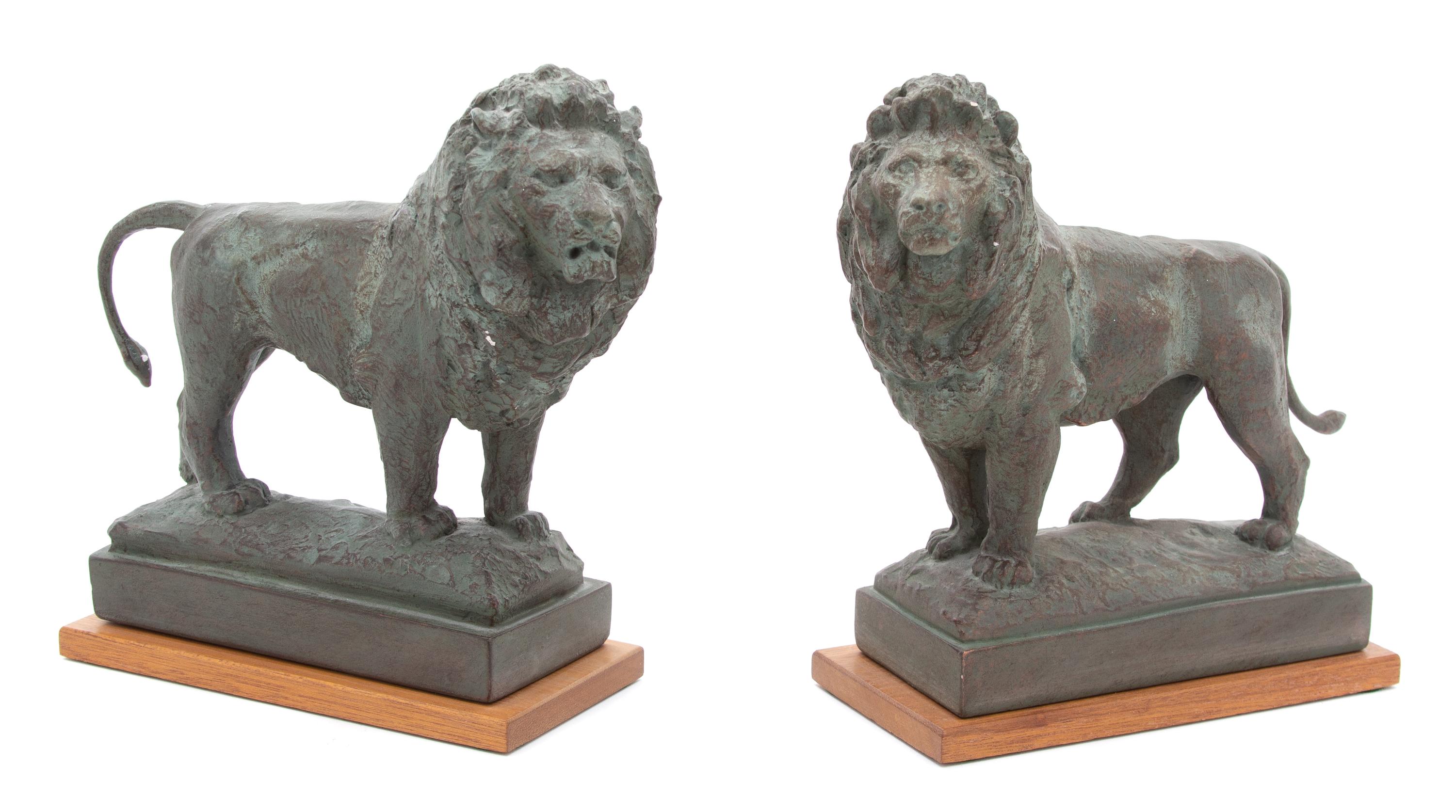 Pair of Composition Collosal Lions Bookends Height 8 3/4 inches. — 20TH CENTURY