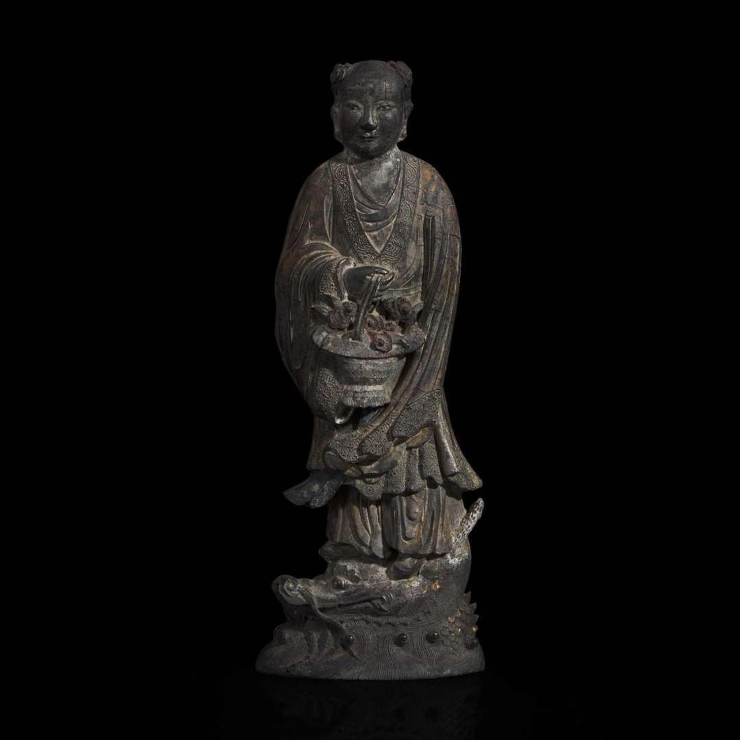 A Chinese parcel-gilt "Lan Caihe" ink cake 漆金仙人造形墨饼一件 "Hu ziqing" mark ??????; Qing dynasty, 19th century ? ????