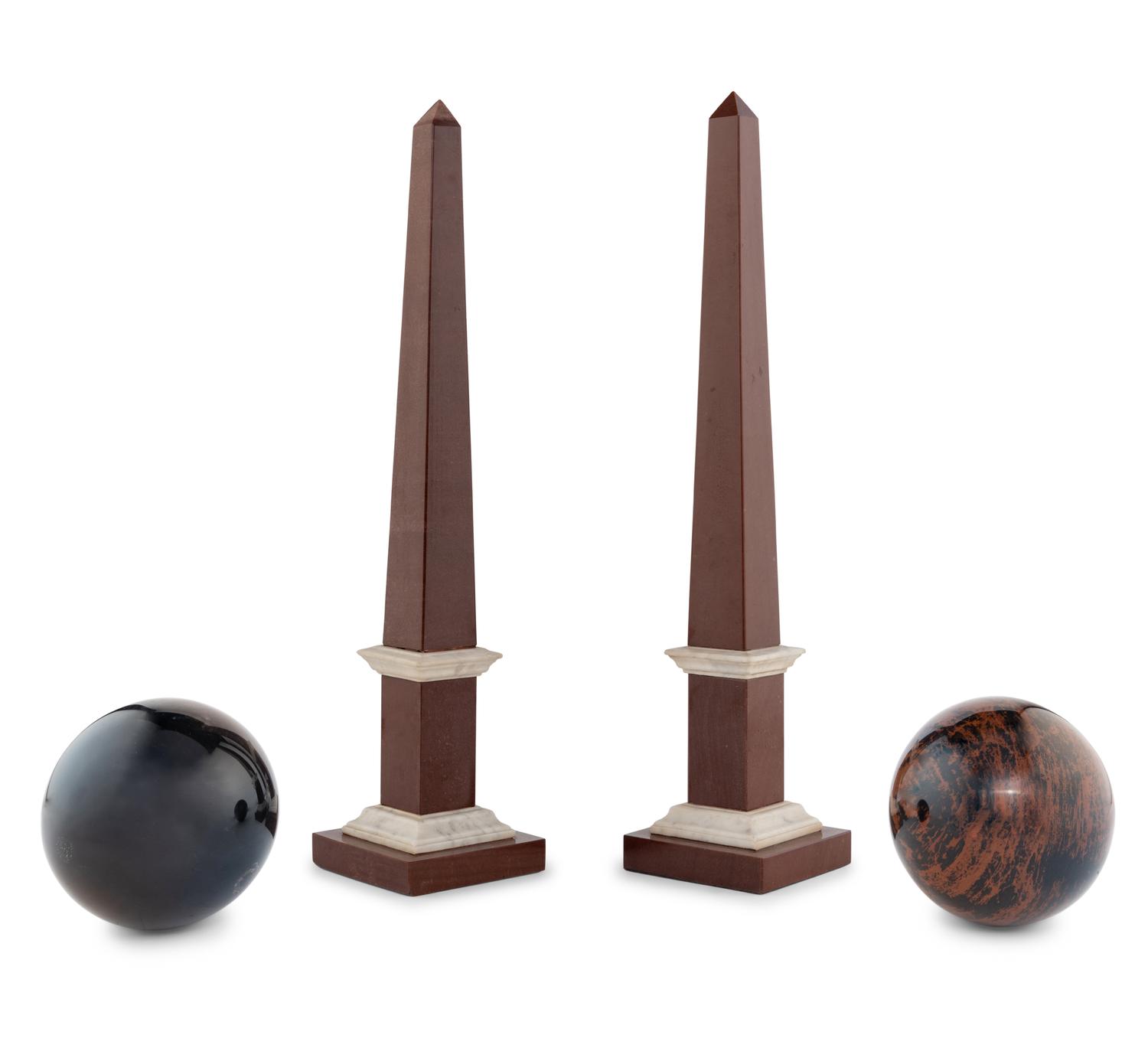 A Pair of Hardstone Obelisks and a Pair of Hardstone Spherical Ornaments