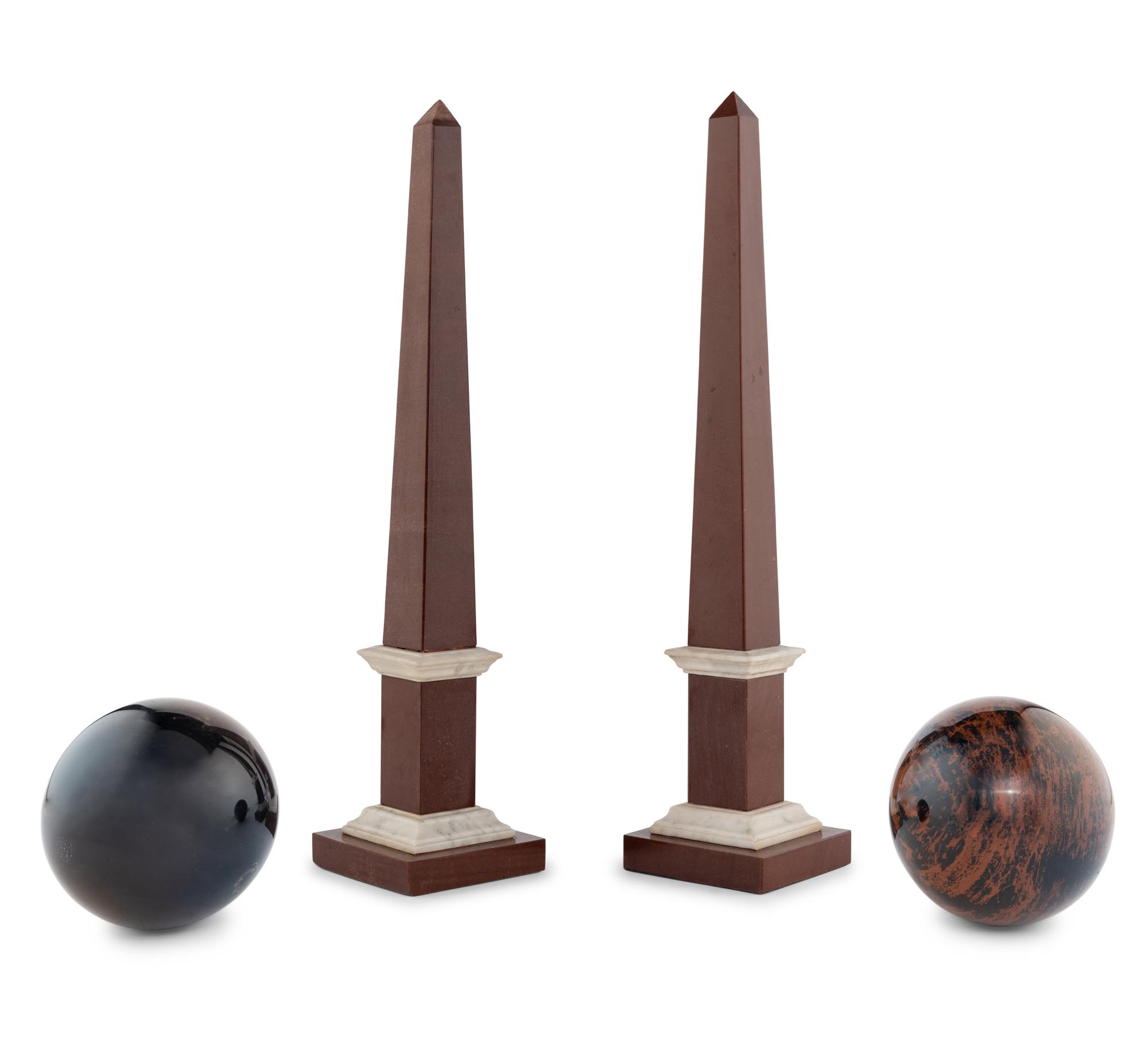 A Pair of Hardstone Obelisks and a Pair of Hardstone Spherical Ornaments