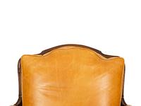 A Louis XVI Style Carved Mahogany Leather Upholstered Bergeré — 20th Century